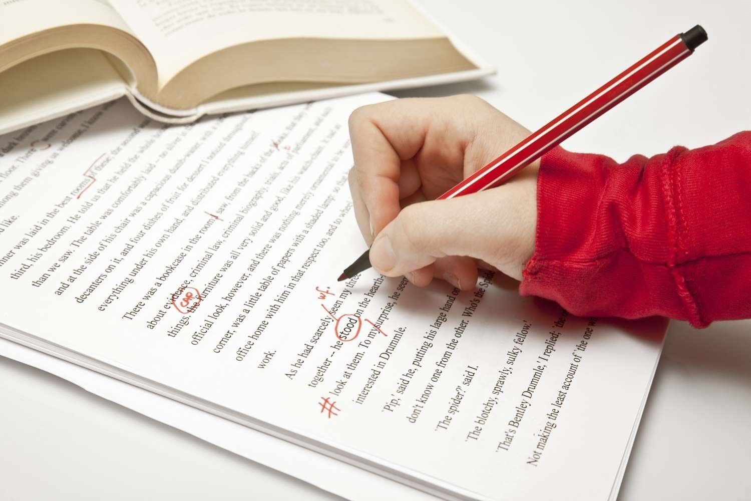 A manuscript being carefully edited